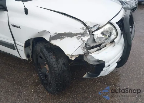 2003 Suzuki Vitara из США, поврежденный, VIN 2S3TE52V636107099